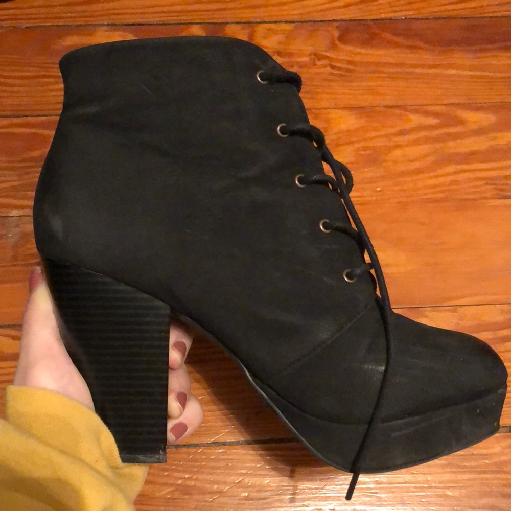 Black high heeled boots, size 9.5